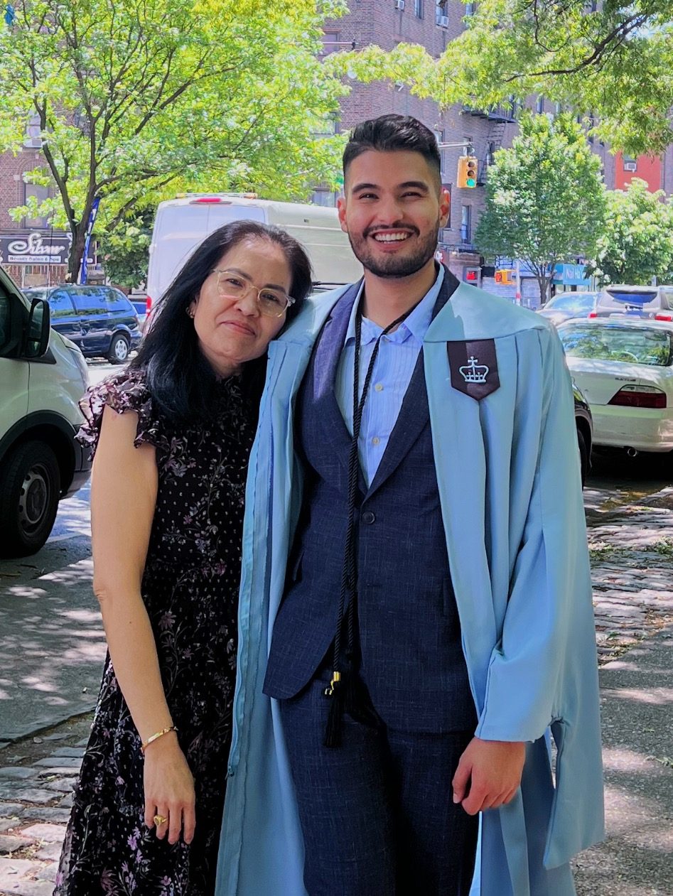 David Guirgis with his mother at his graduation ceremony